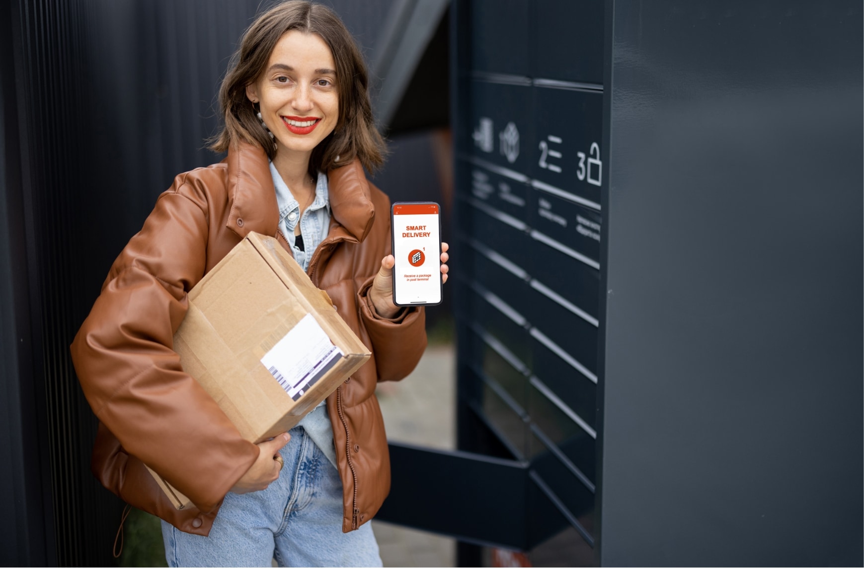A woman collects a parcel in a locker and shows the validation on her phone.